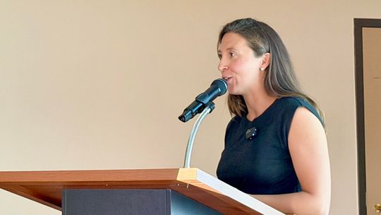 Ely graduate and health policy professional Amy Bianco presents on Medicaid eligibility changes at Tuesday Group