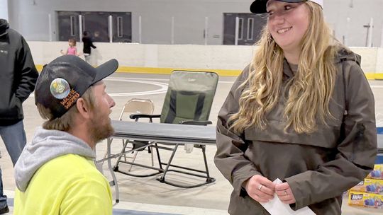 Getting down on one knee and proposing
