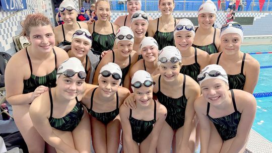 Swimmers notch first dual win