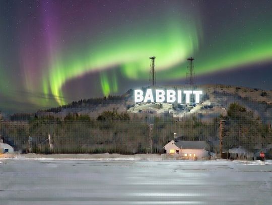 April Fools fun with sign, family side by side