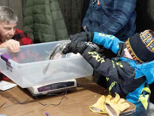 Contestants brave wind during annual Rod & Gun Club ice fishing contest