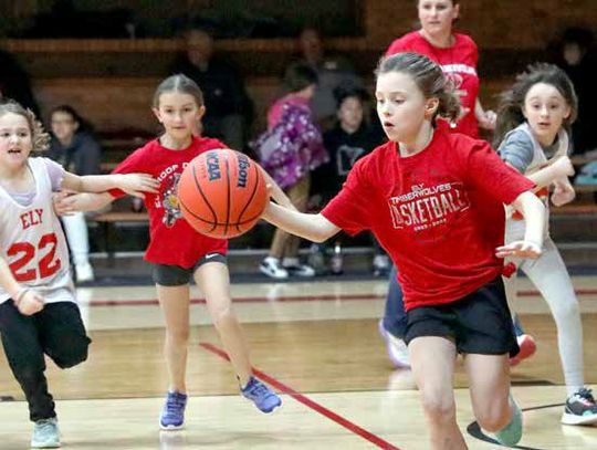 Elementary basketball was played at halftime of a high school girls basketball game with Coraline Kozak, Cora Lovich, Kaelyn Puzel and Laurana Smith on the court.