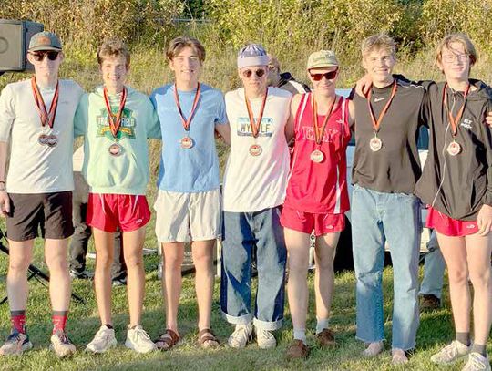 Ely boys win Rapids meet
