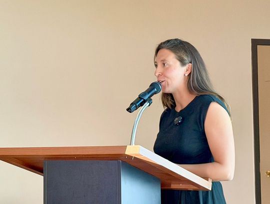 Ely graduate and health policy professional Amy Bianco presents on Medicaid eligibility changes at Tuesday Group