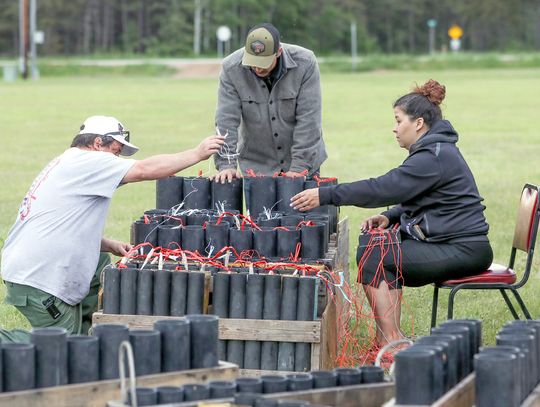 Helping set up for the fireworks were Morse-Fall Lake firefighters Chris Schlosser