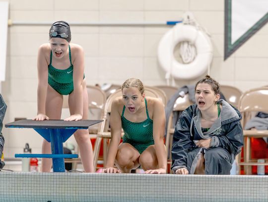 NRE swim team fit to be tied