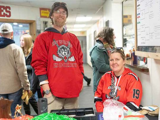 Matt Fetterer and Nicolette Cook sell tickets at the entrance of the Ely Ice Arena during last weekend’s hockey tournament.