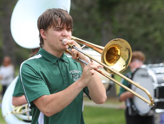 Playing trombone for the Northeast Range marching band was Matthew Bock