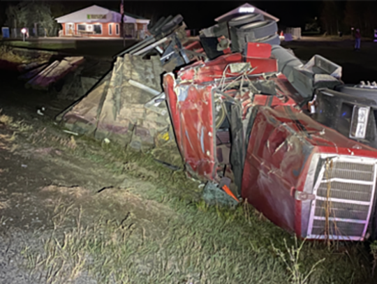 Semi tractor-trailer rollover in Embarrass