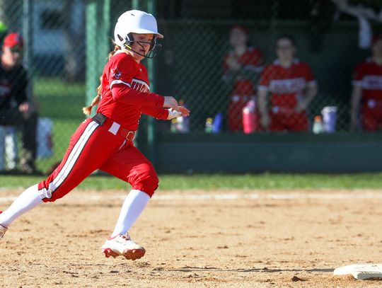 Softball team moves on