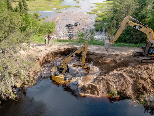 Storm floods, closes roads