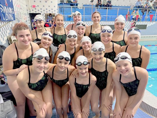 Swimmers notch first dual win