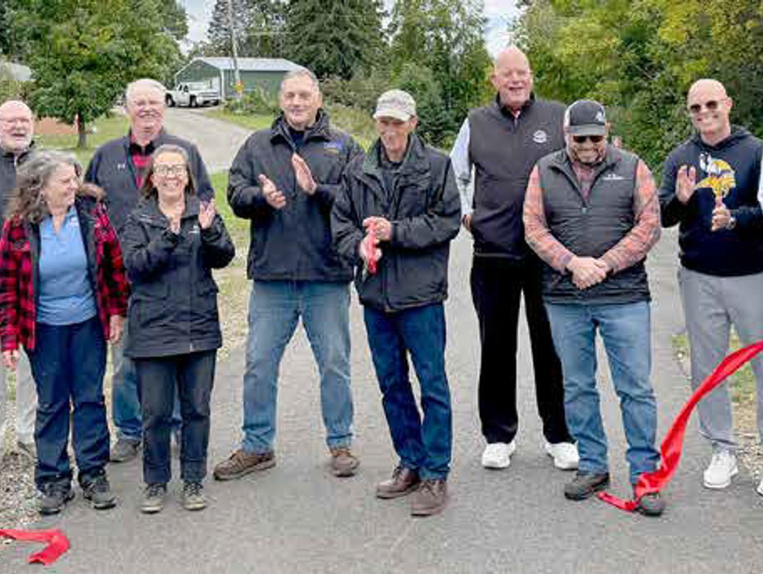 Project leadership cuts the ribbon to celebrate Mesabi Trail completion
