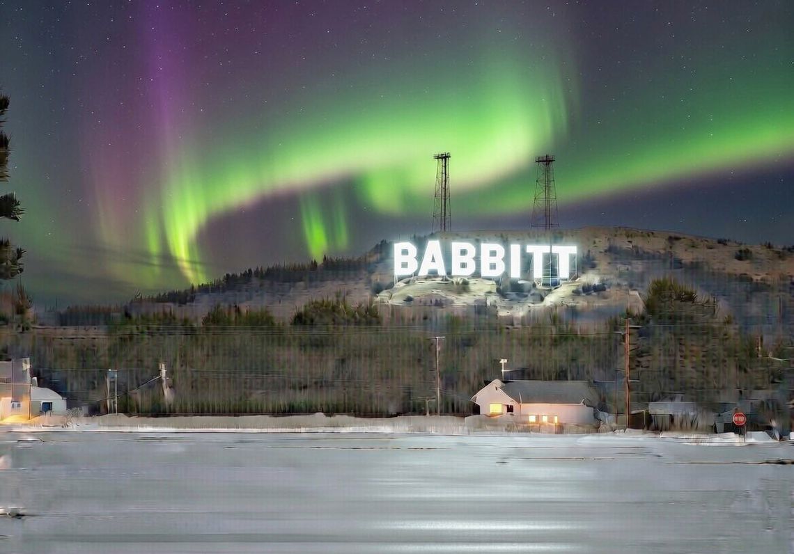 April Fools fun with sign, family side by side