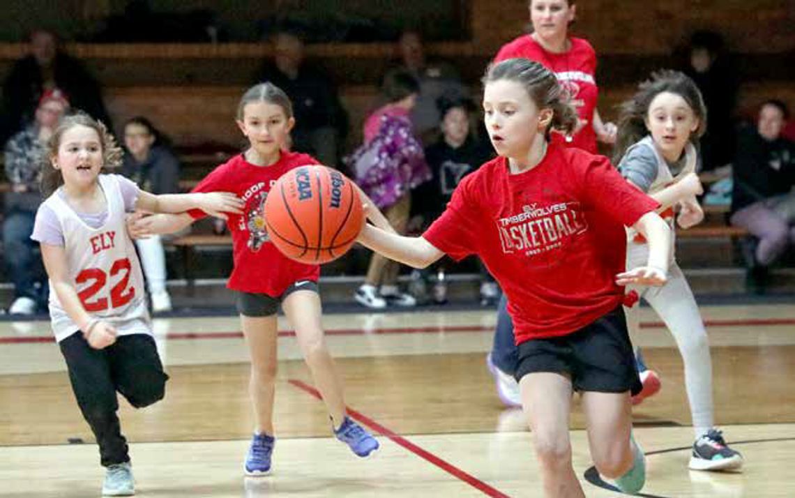 Elementary basketball was played at halftime of a high school girls basketball game with Coraline Kozak, Cora Lovich, Kaelyn Puzel and Laurana Smith on the court.