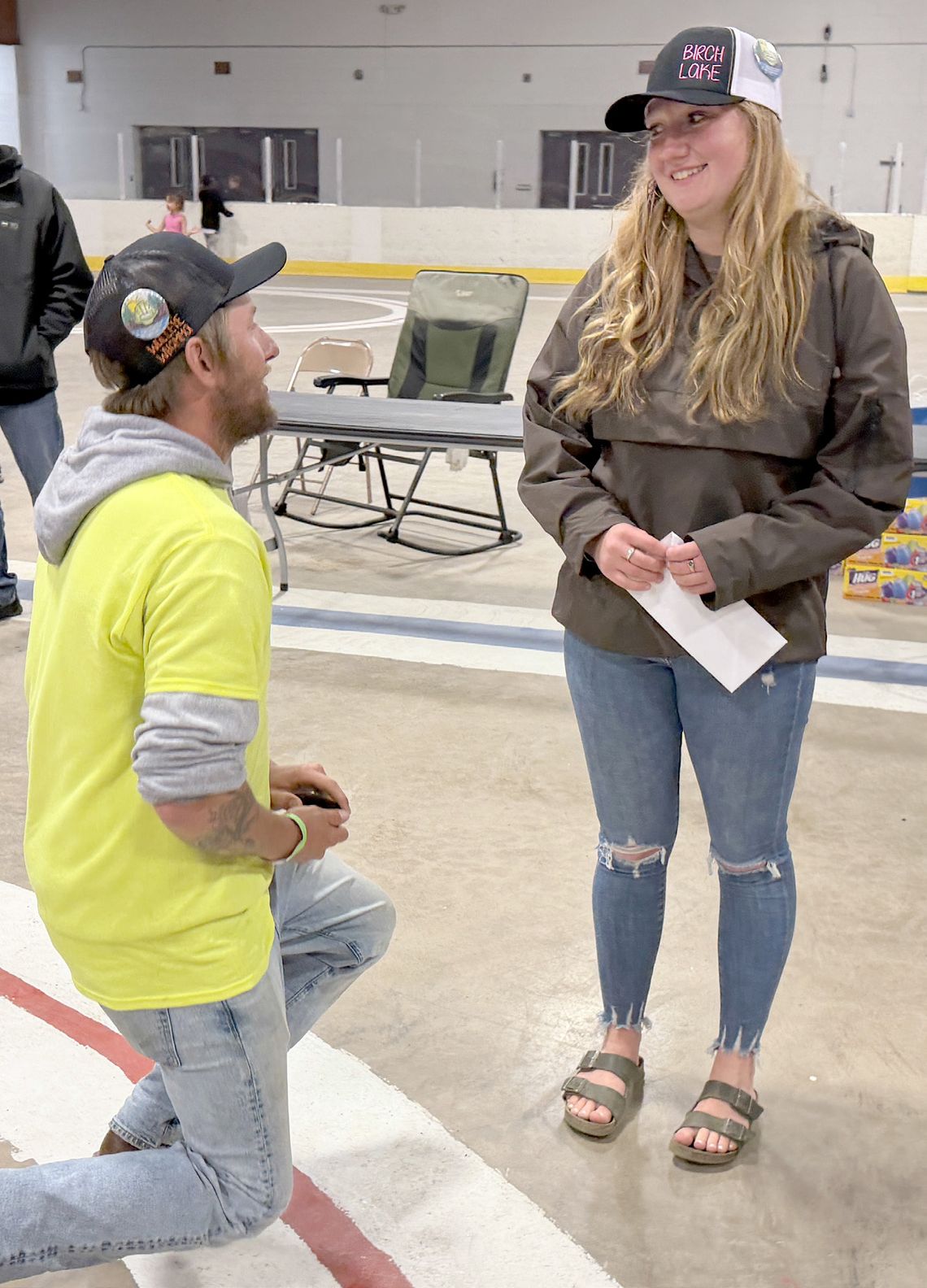 Getting down on one knee and proposing