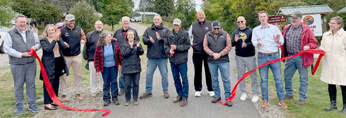 Project leadership cuts the ribbon to celebrate Mesabi Trail completion Project leadership cuts the ribbon to celebrate Mesabi Trail completion