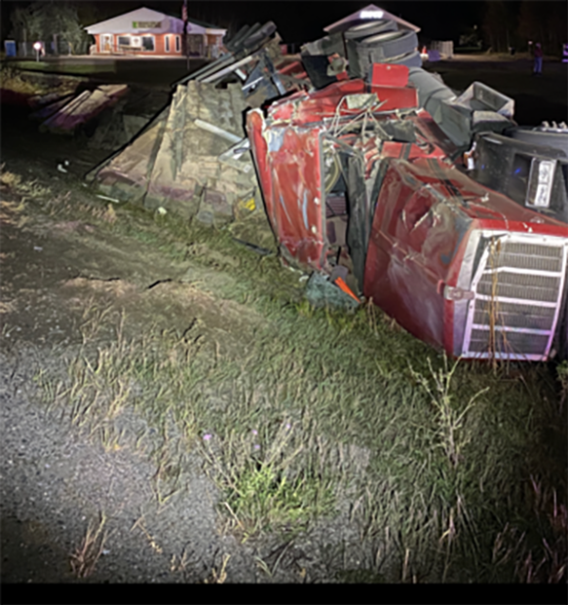 Semi tractor-trailer rollover in Embarrass