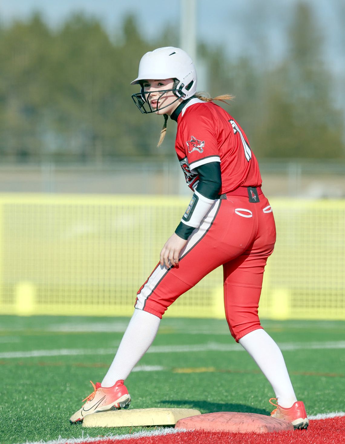 Softball team opens with a win