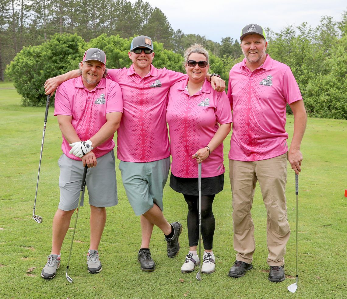 Stopping for a photo op at the par 3 tournament were teammates Joe Koivisto