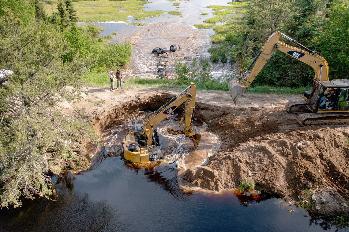 Storm floods, closes roads